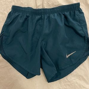 Teal Nike running shorts